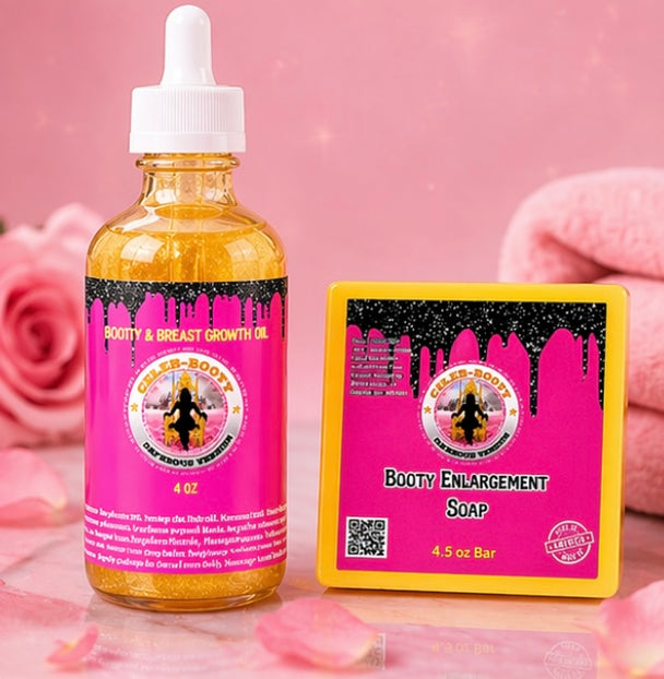 Bottle of 'Booty & Breast Growth Oil' and soap bar on a pink background with roses.