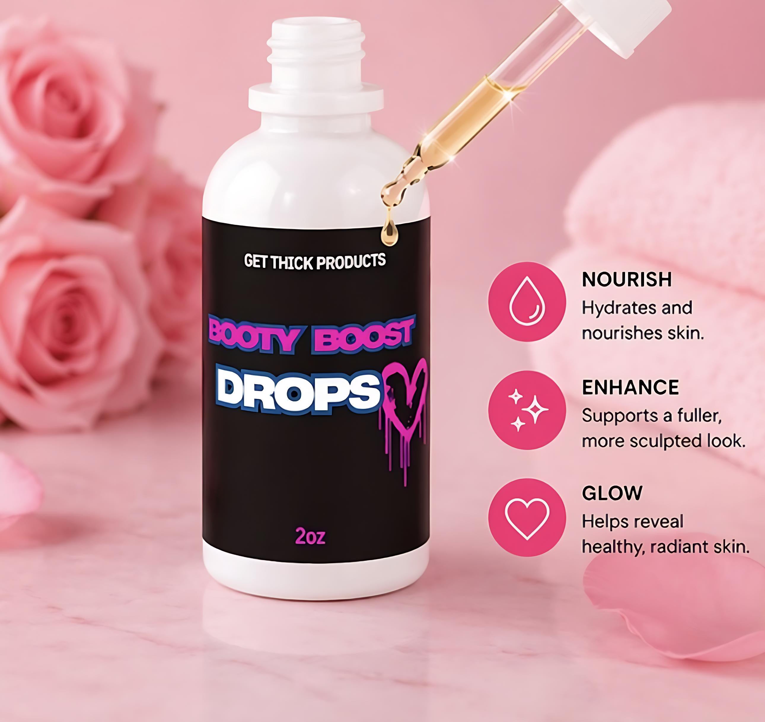 Bottle of 'Booty Boost Drops' with dropper on a pink background with roses.