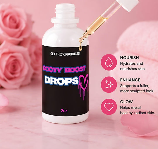 Bottle of 'Booty Boost Drops' with dropper on a pink background with roses.