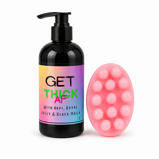 Black bottle with colorful label and pink textured object on a white background